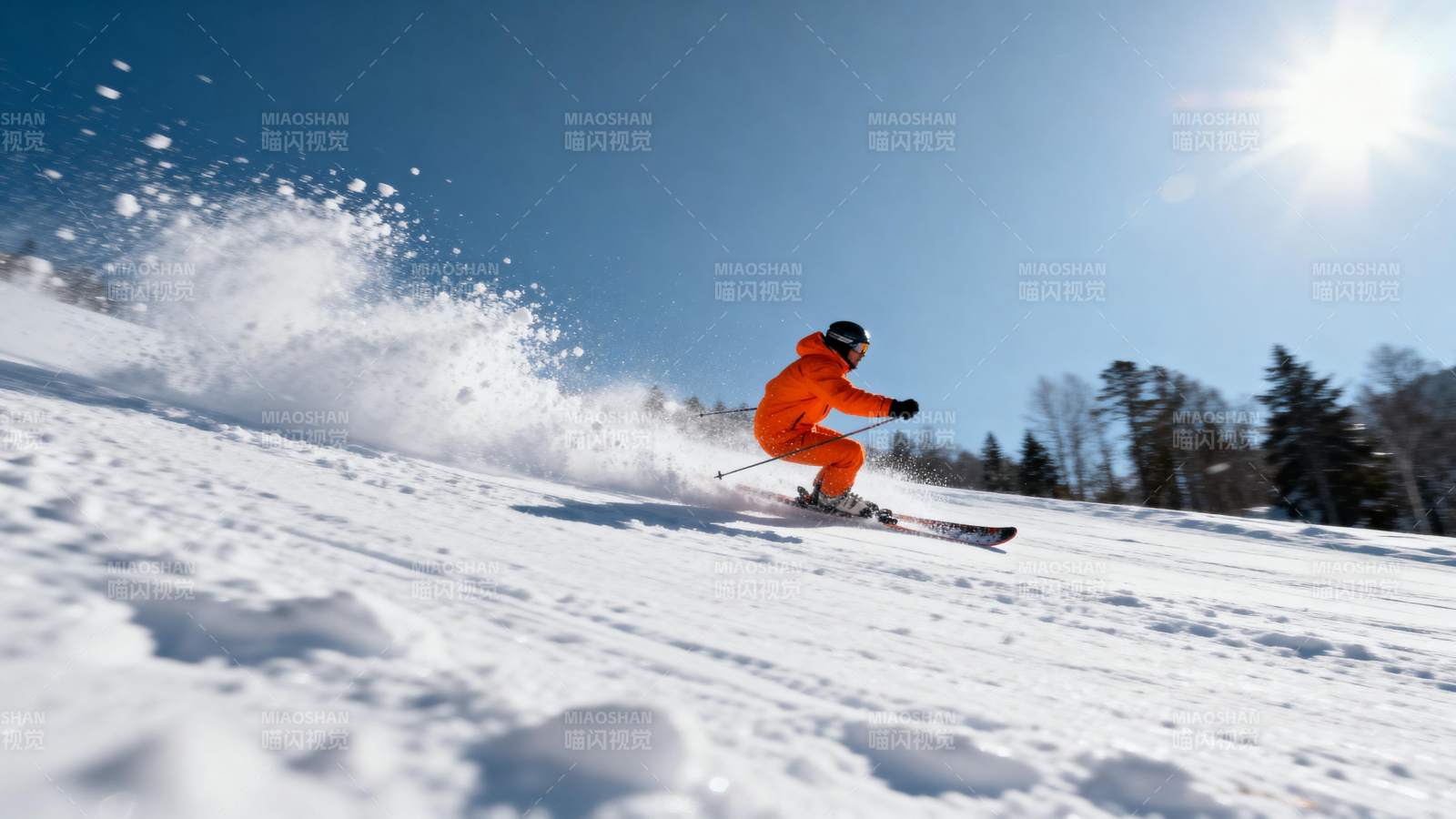 滑雪者疾驰雪坡图片