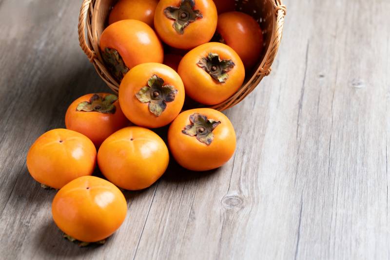 柿子满篮秋意浓图片