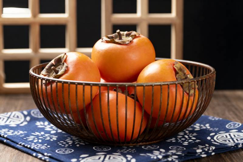 柿子满篮秋意浓图片