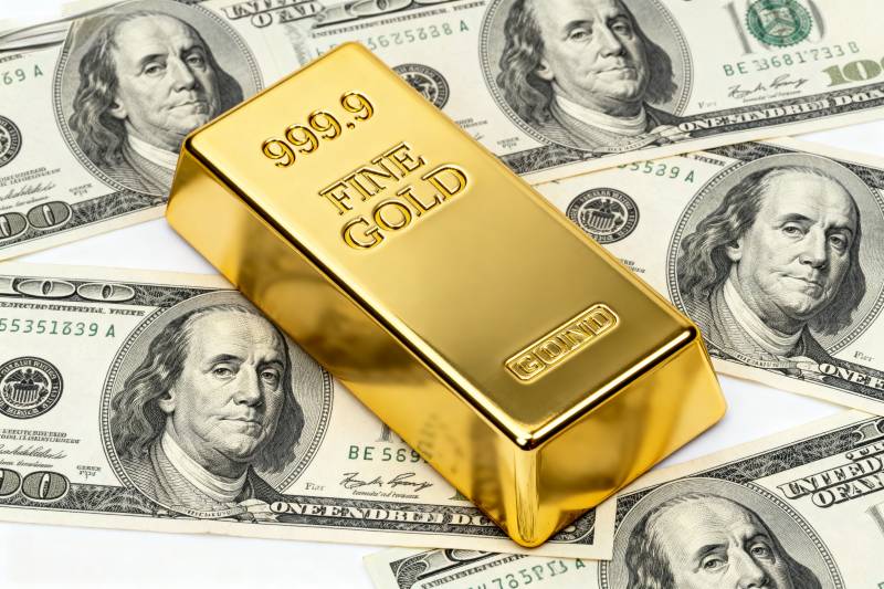 金条与美元钞票图片