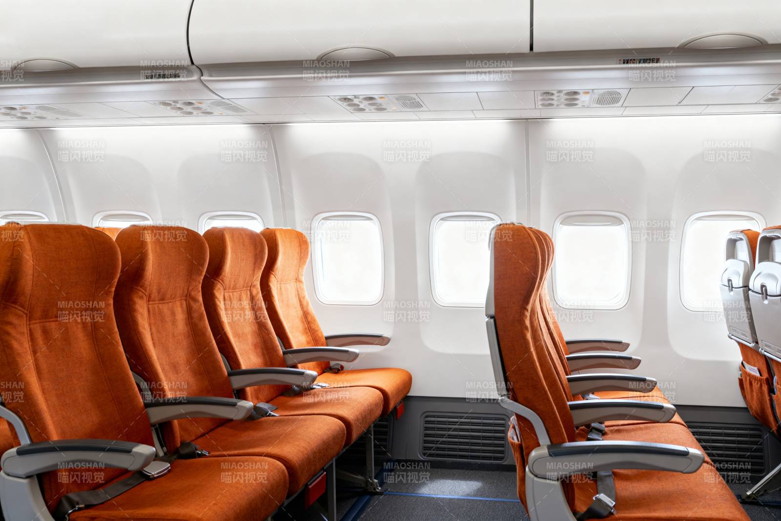 飞机客舱橙色座椅图片