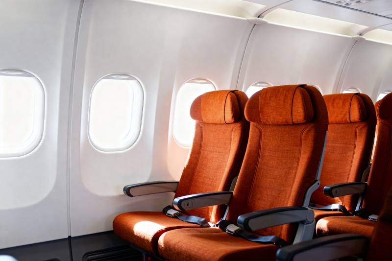 飞机客舱橙色座椅图片
