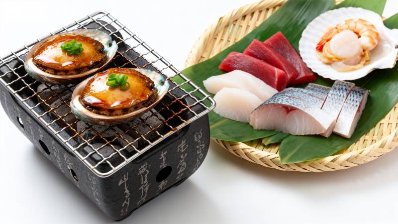 日式烤鲍鱼与刺身图片