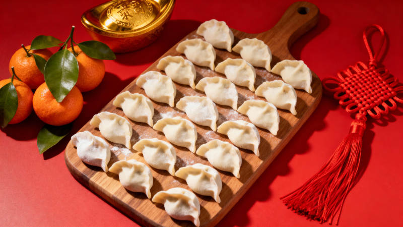春节饺子与金桔图片