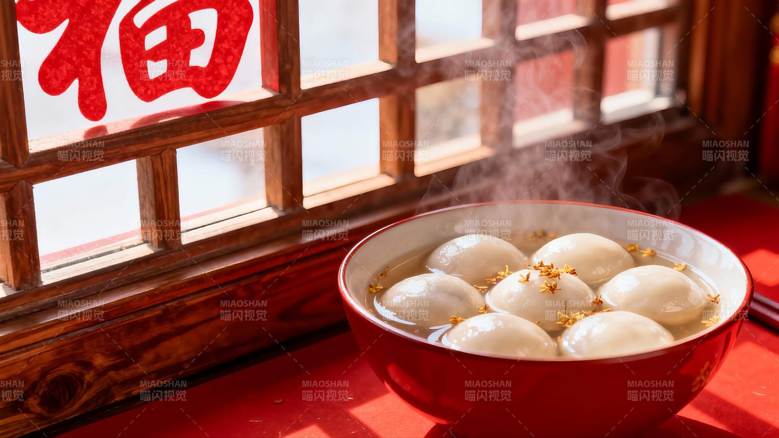 热气腾腾的汤圆配窗花图片