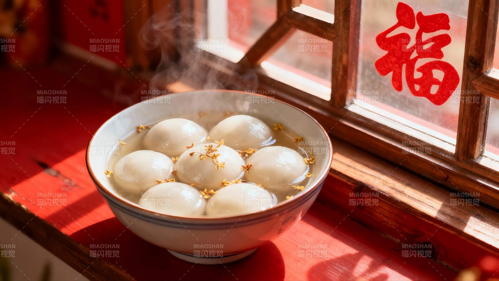 热气腾腾的汤圆碗图片