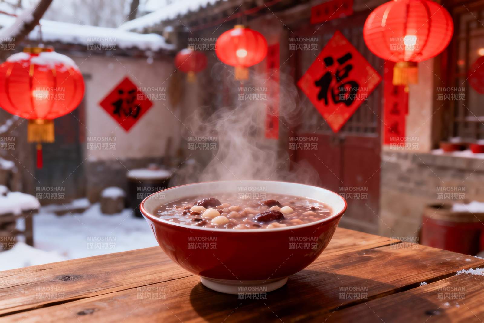 雪地红碗腊八粥热气腾腾图片