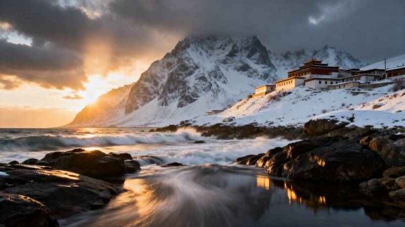 雪山日出海岸风光图片