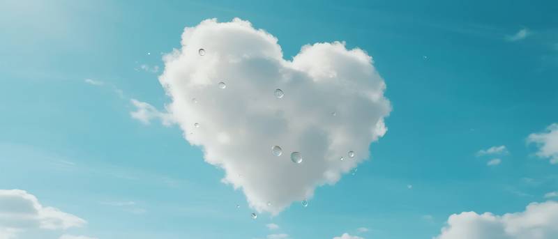 心形云朵飘蓝天图片