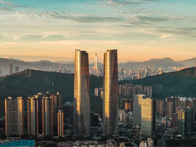 城市双塔日落景图片