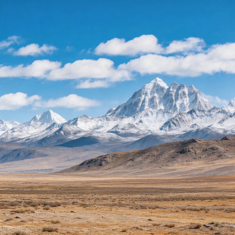 雪山荒原 蓝天白云图片