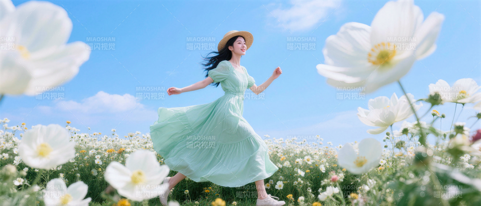 花海中的绿裙少女图片