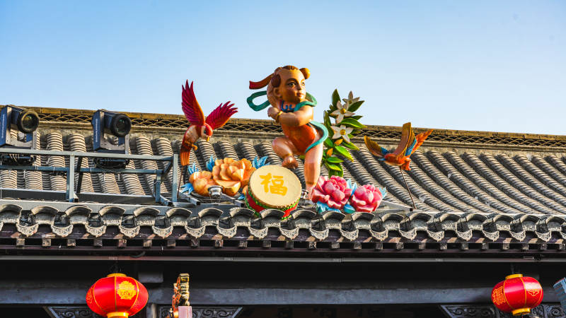 屋顶彩雕迎春景图片