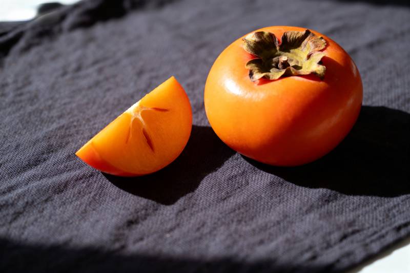 柿子切片静物图片