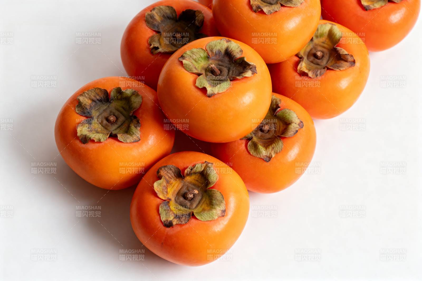 新鲜柿子堆叠图图片