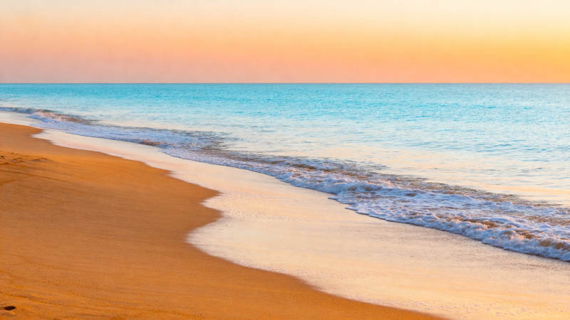 夕阳海滩美景图片