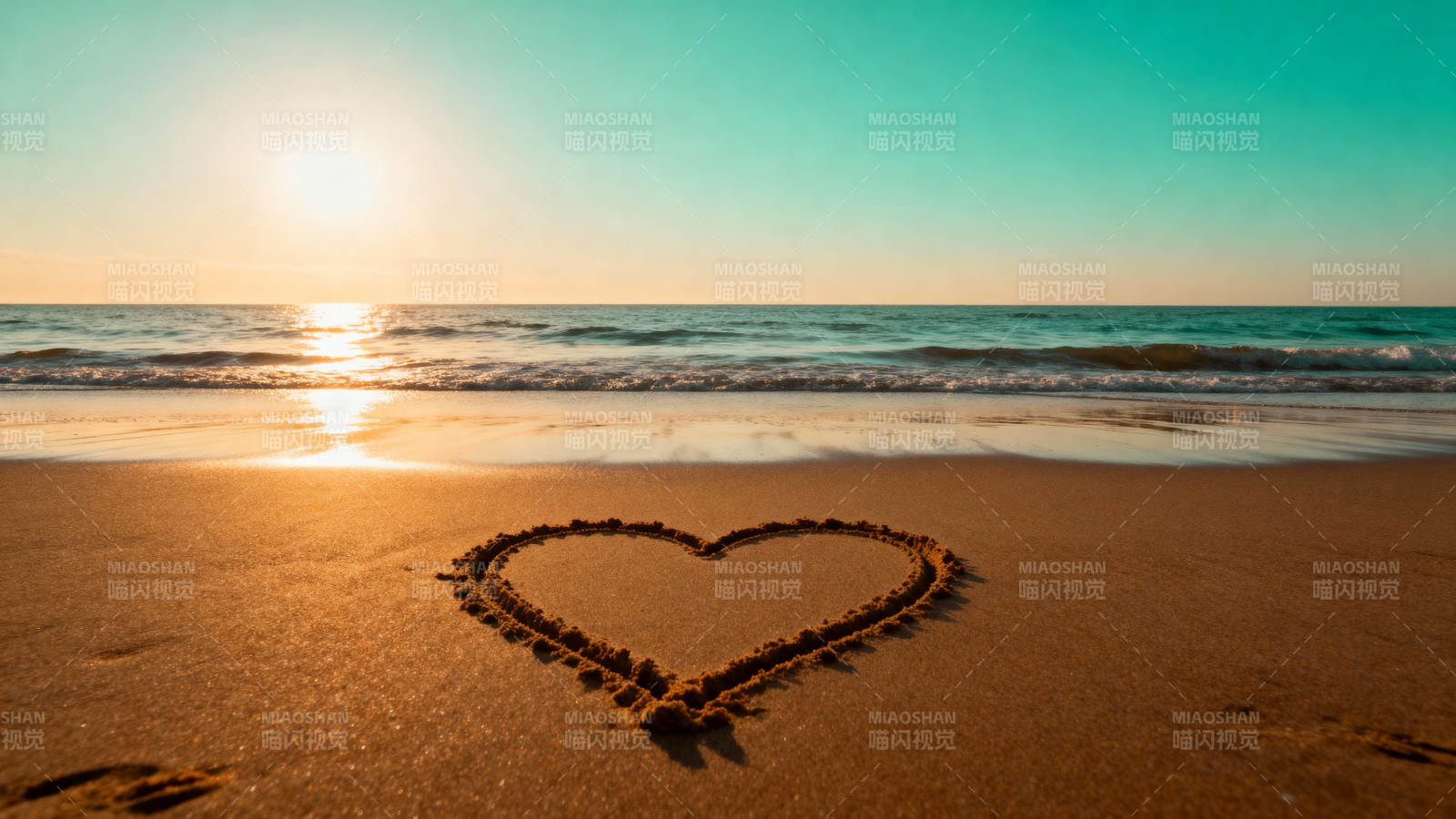 沙滩心形日落图片
