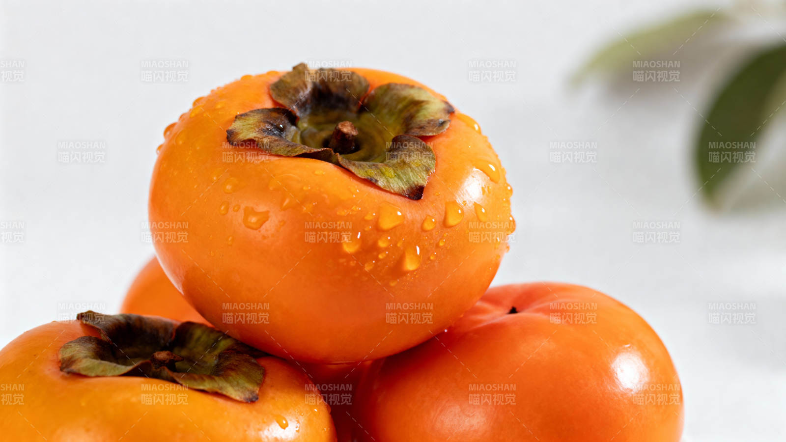 鲜橙柿子堆叠图片