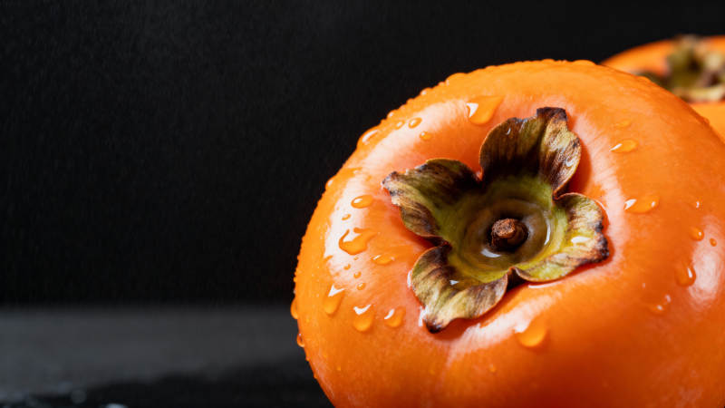 橙色柿子特写图片