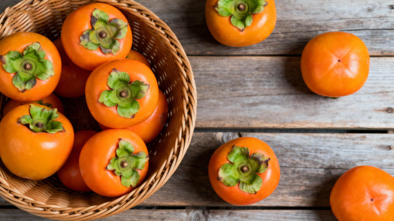 篮中柿子鲜橙色图片