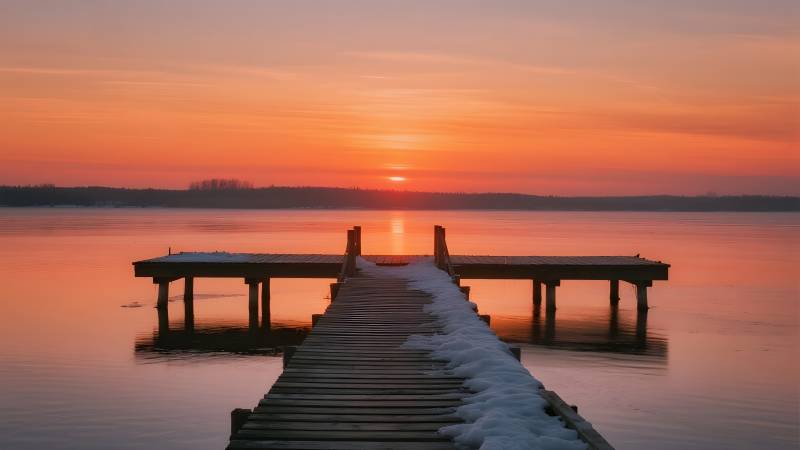雪桥日落湖景图片