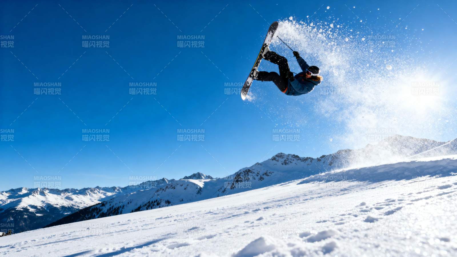 雪上飞驰 腾空而起图片