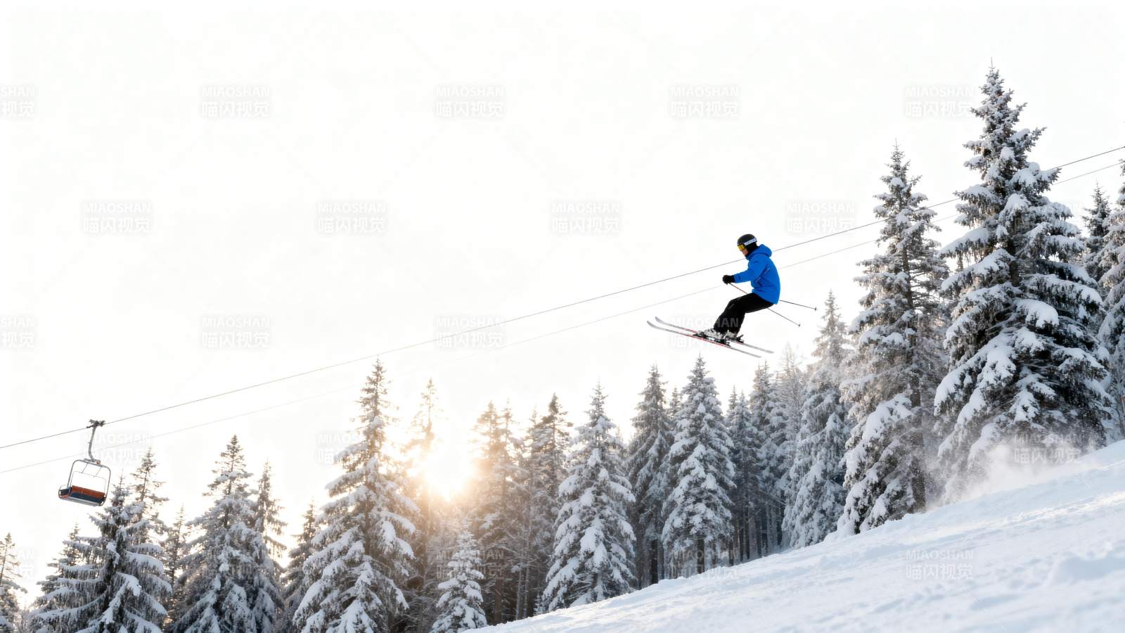 滑雪者飞跃雪坡图片