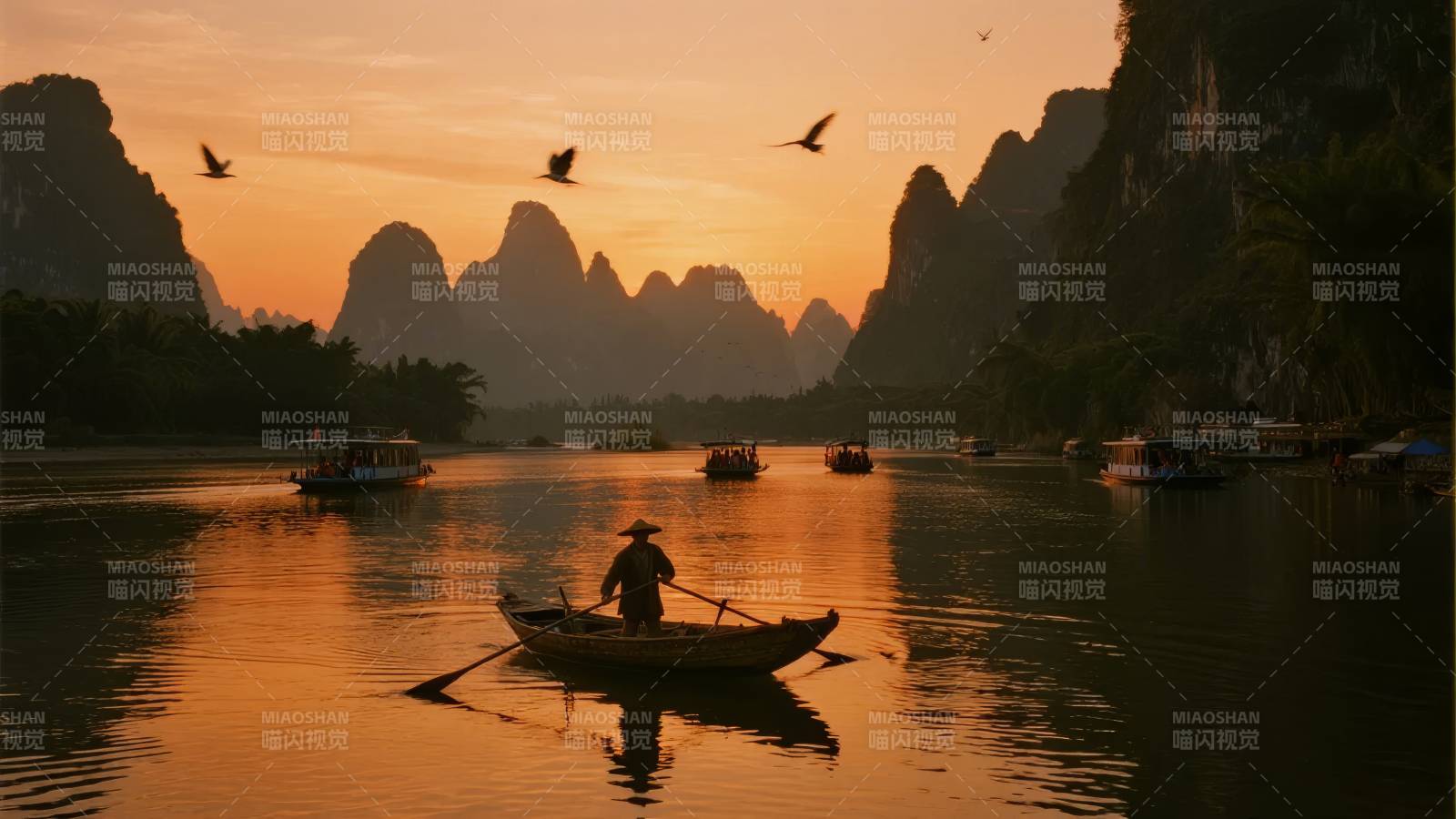 漓江夕照渔舟图片