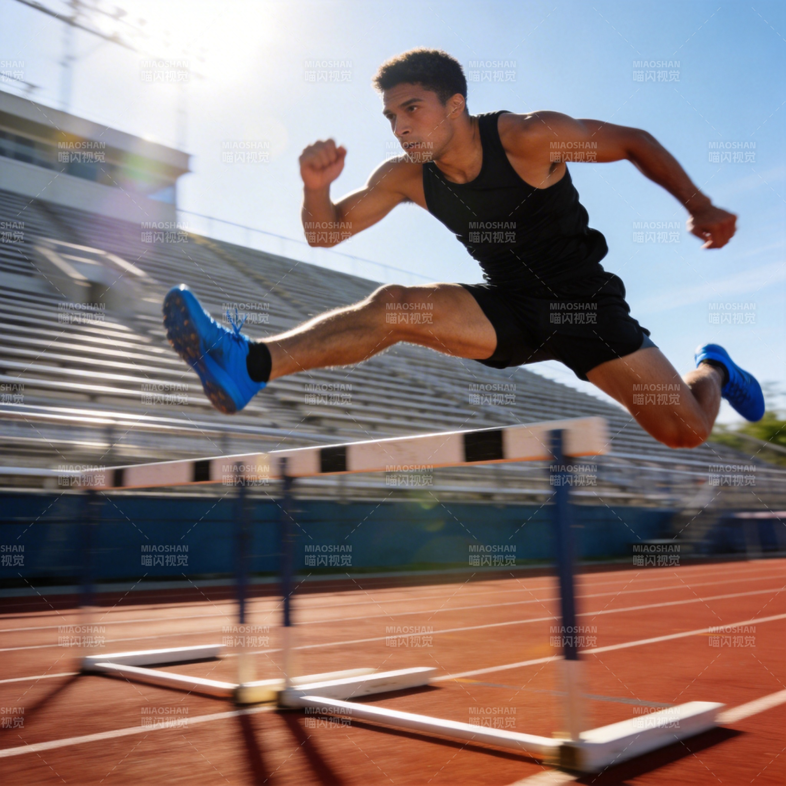 跨栏运动员跃过障碍图片