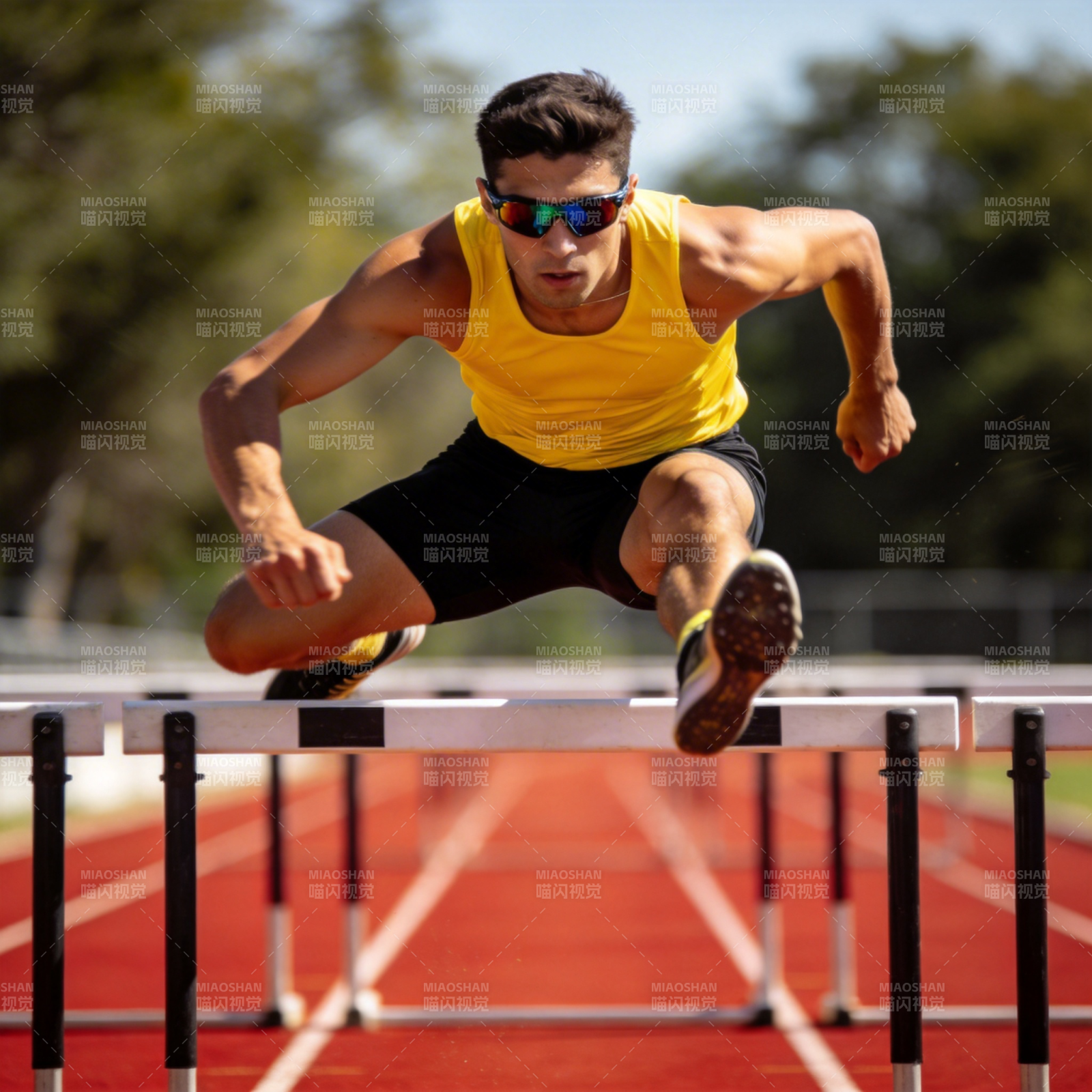 跨栏运动员跃过障碍图片