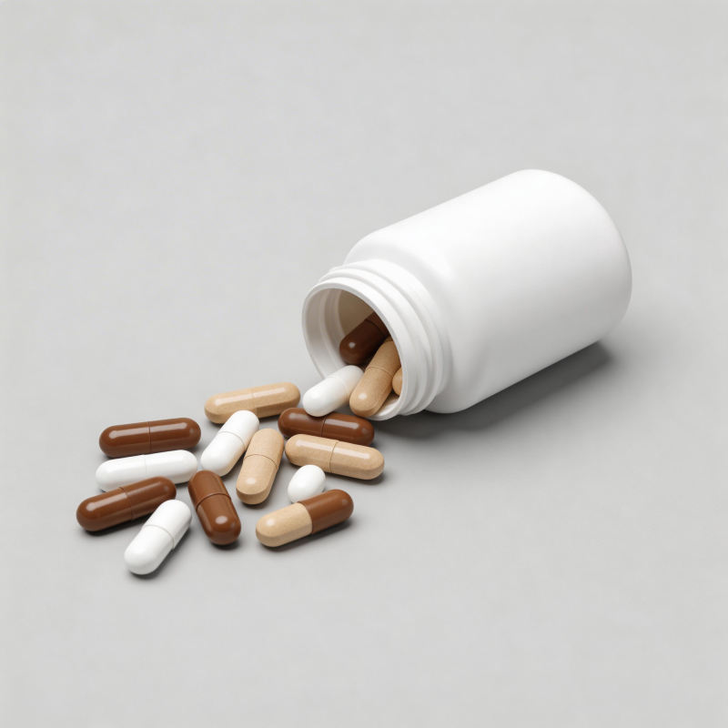 药瓶倾倒胶囊散落图片