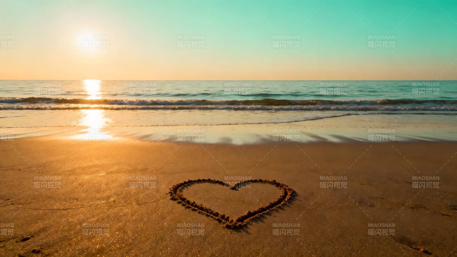 沙滩心形日落图片