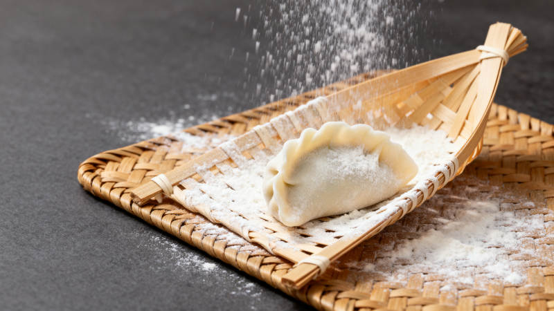 雪落饺子 竹篮静美图片