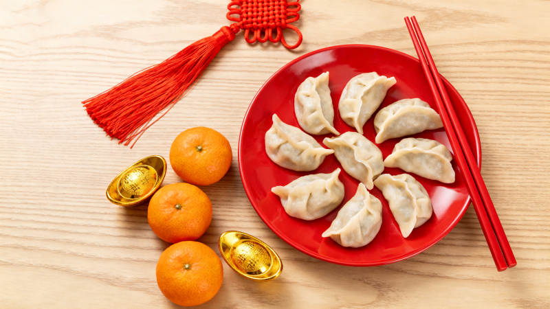春节饺子与金桔图片