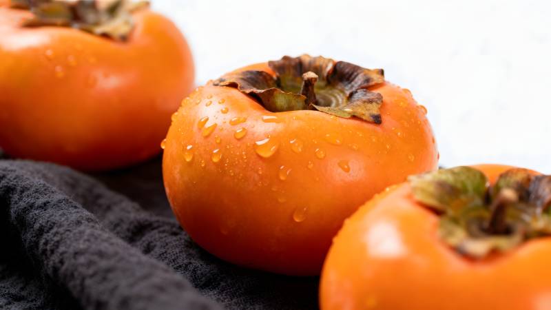 晶莹柿子特写图片