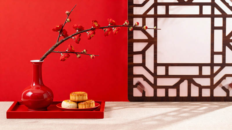 红墙梅枝伴点心图片