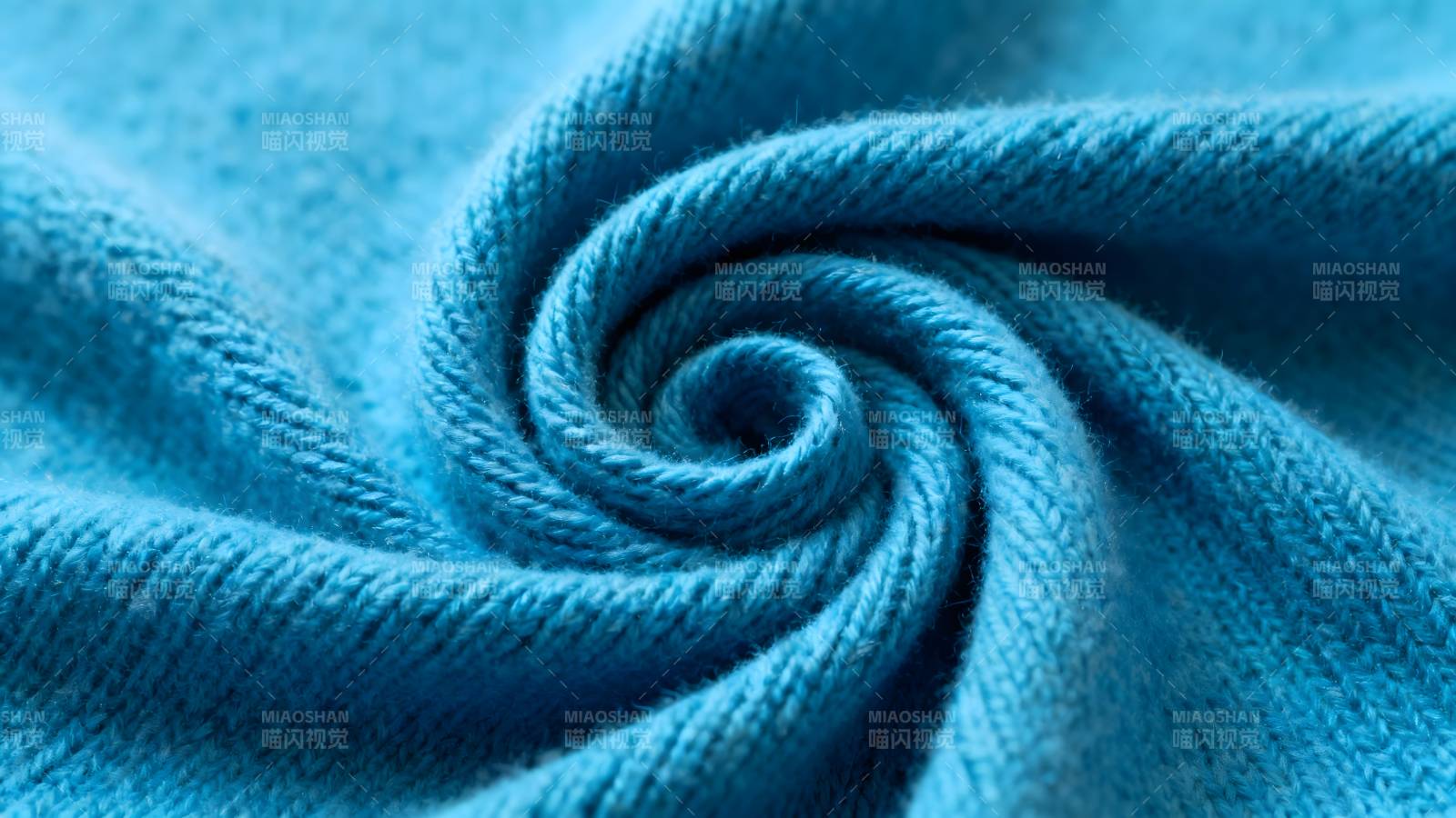 蓝色布料纹理特写图片