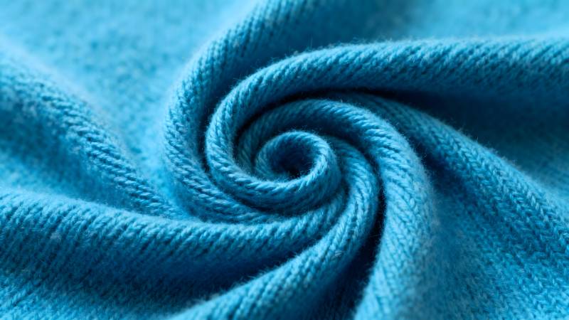 蓝色布料纹理特写图片