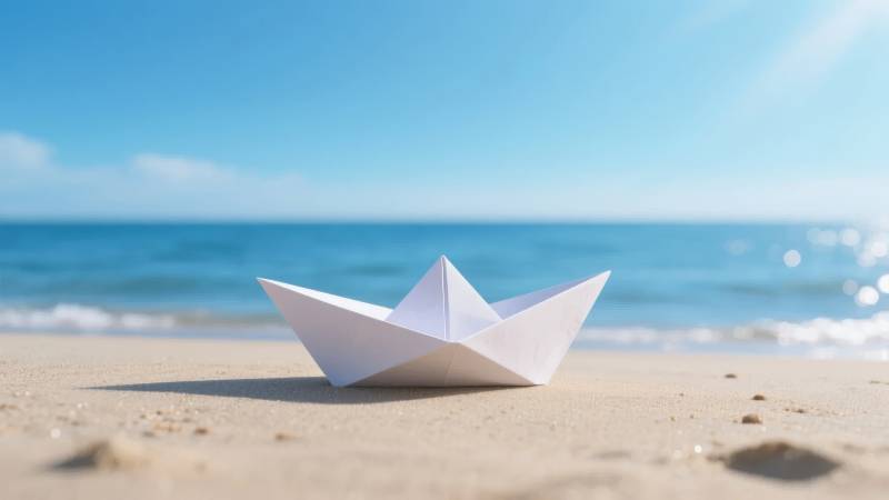 纸船沙滩海景图片