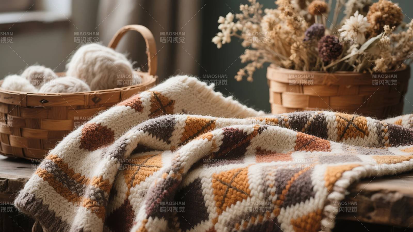 温暖毛毯与干花静物图片