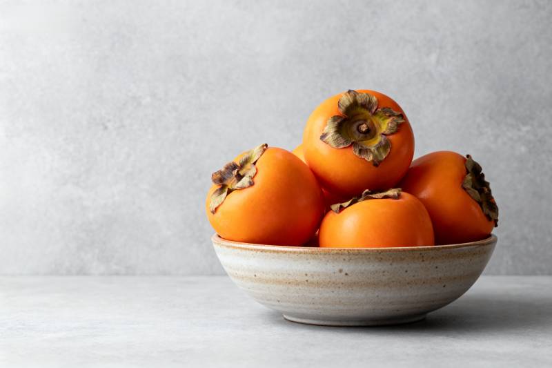 碗中柿子橙黄诱人图片