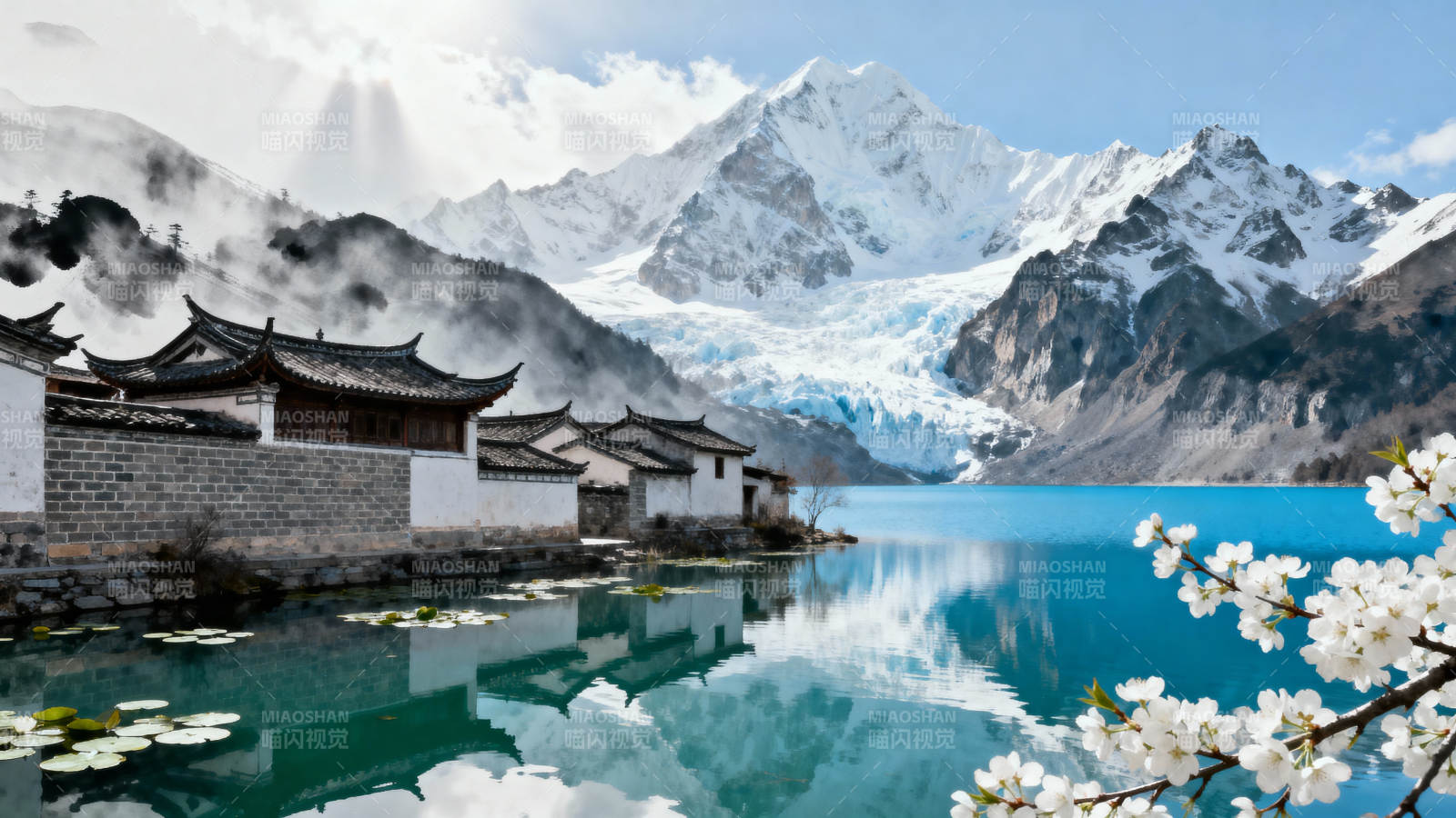 雪山映湖畔春景图片