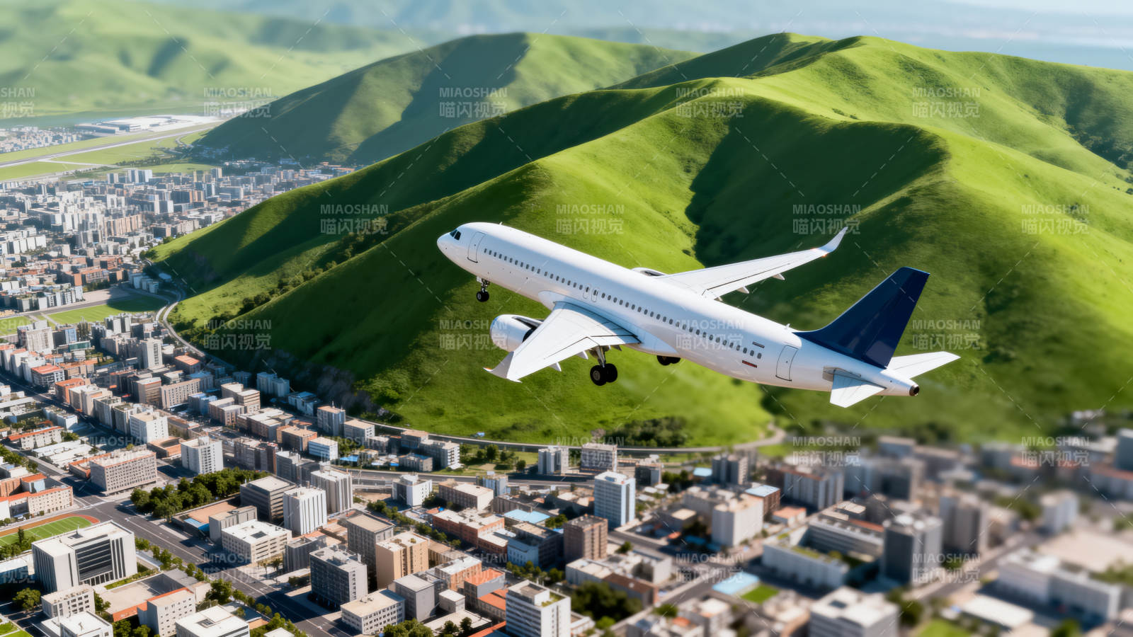 飞机飞越城市山峦图片