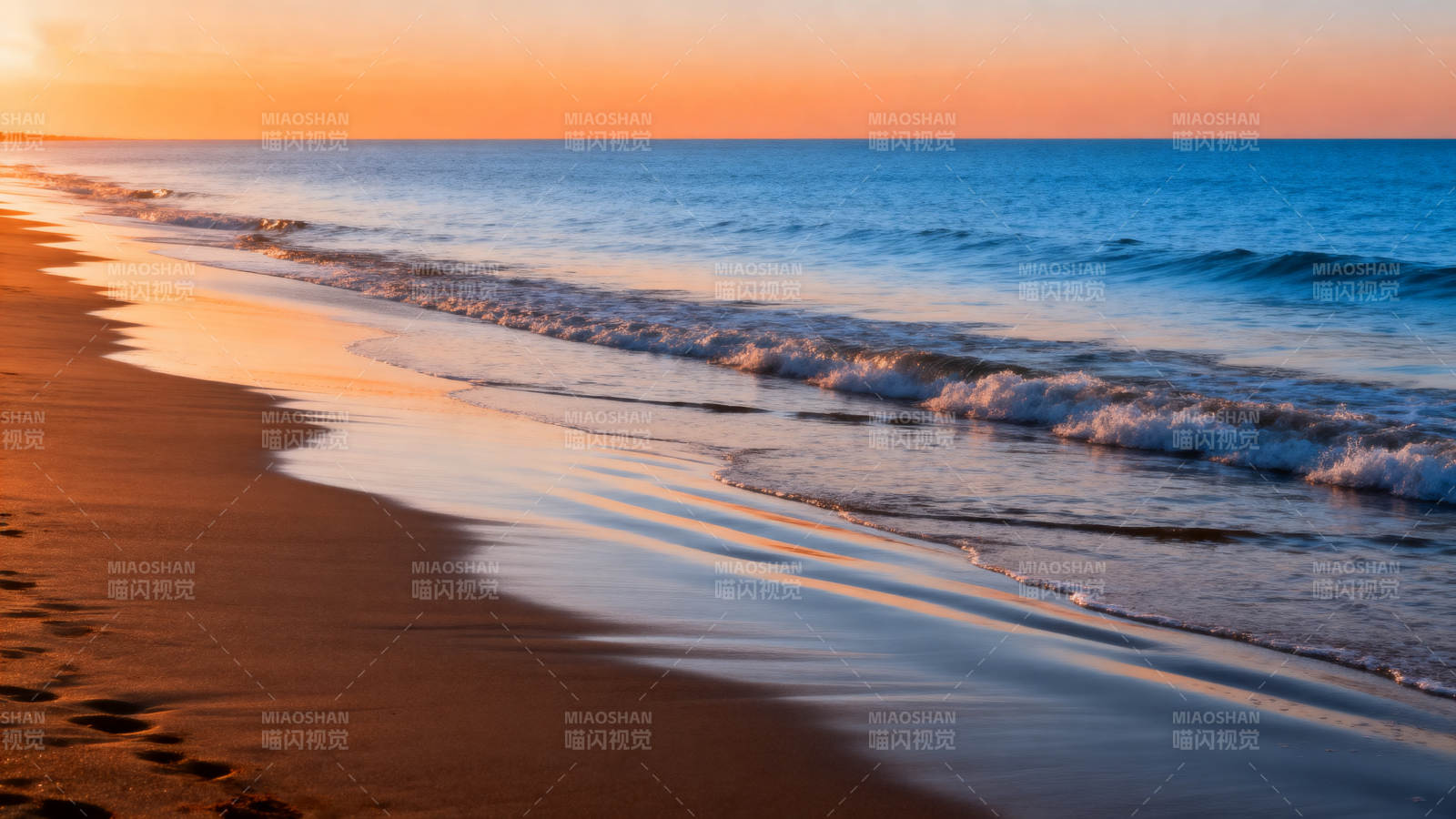 夕阳沙滩海浪图片