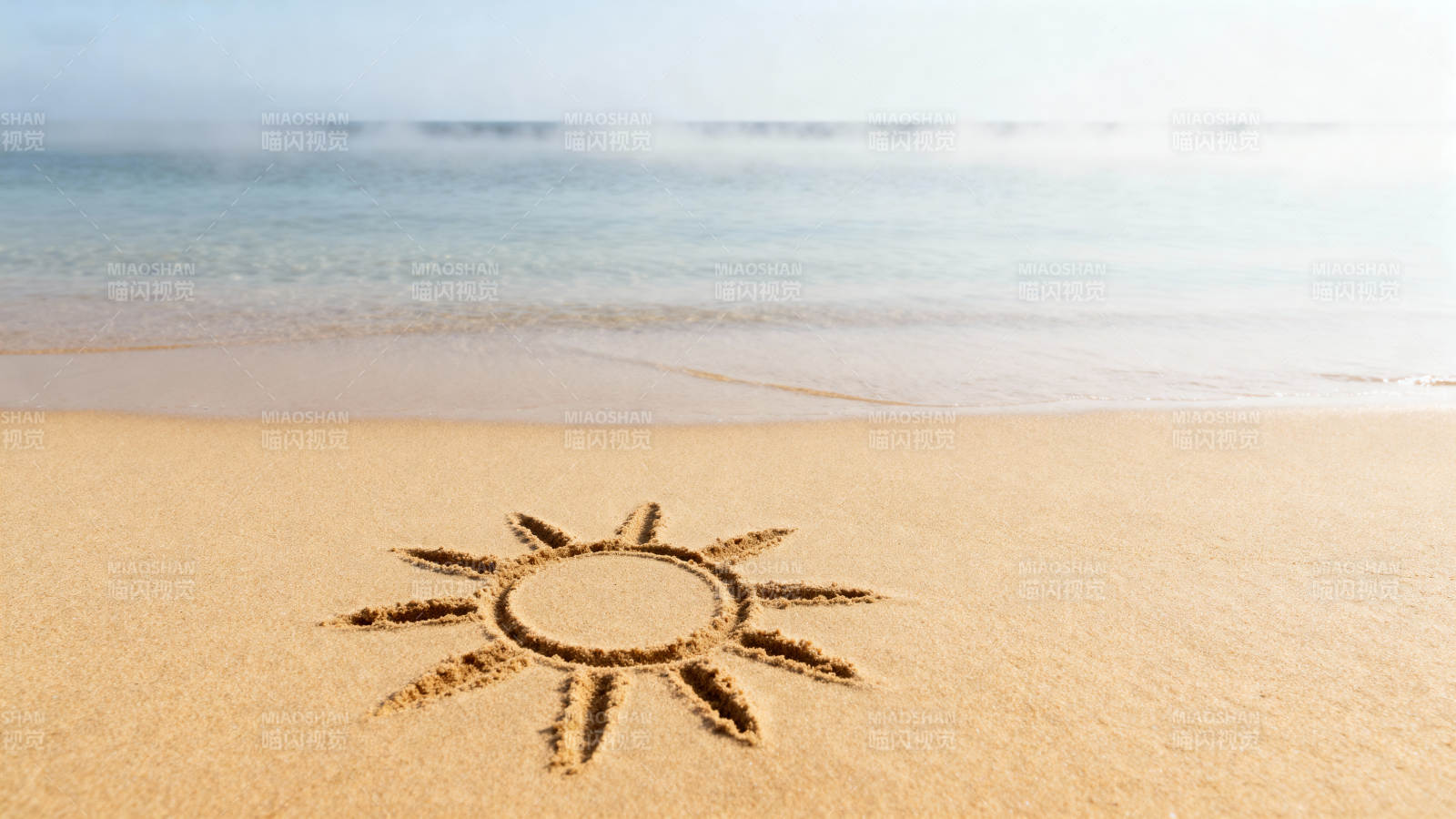 沙滩上的太阳图案图片