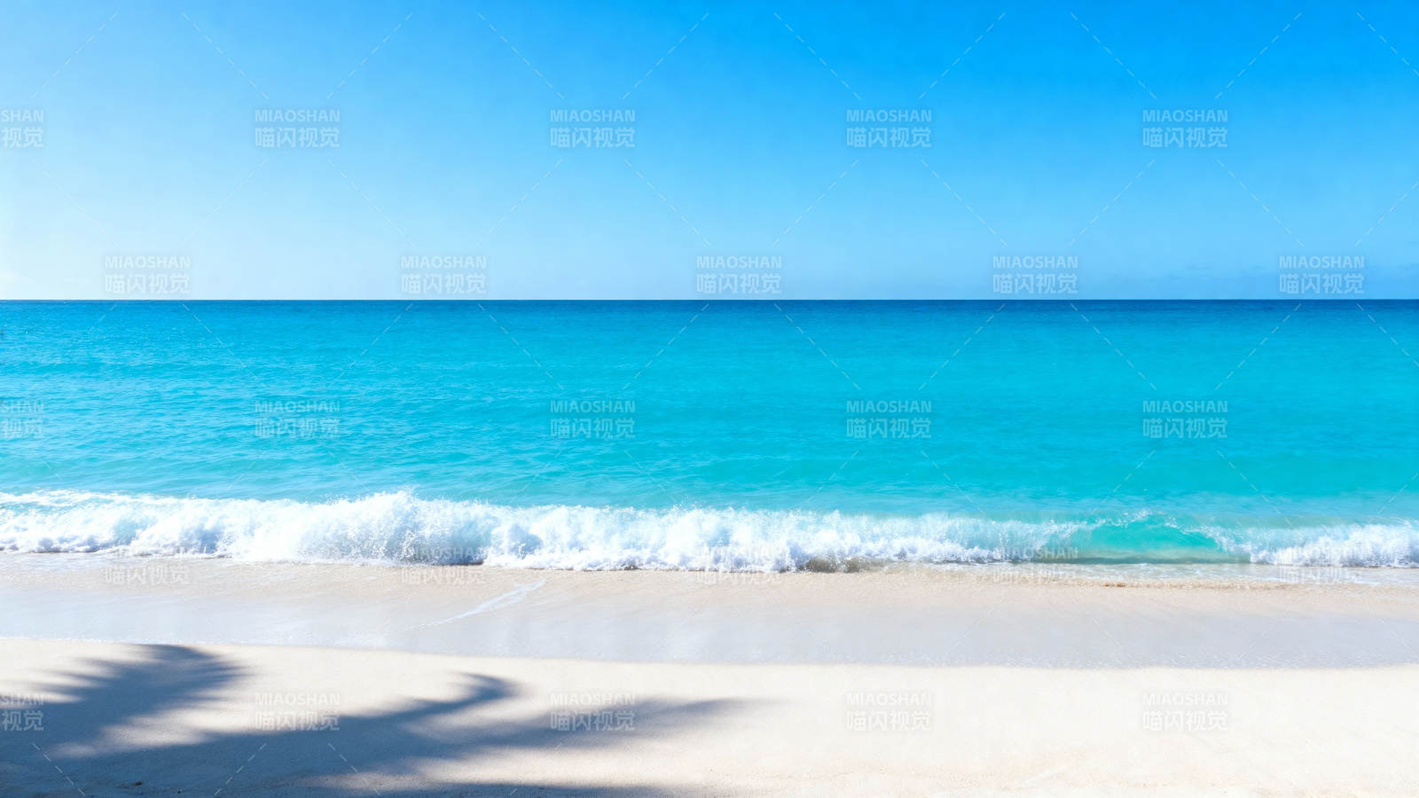 碧海蓝天沙滩影图片