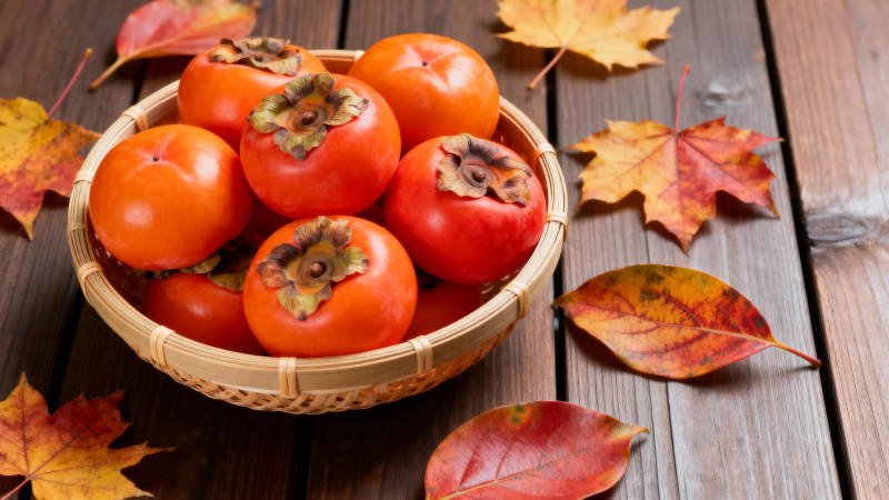 秋日柿子满篮香图片