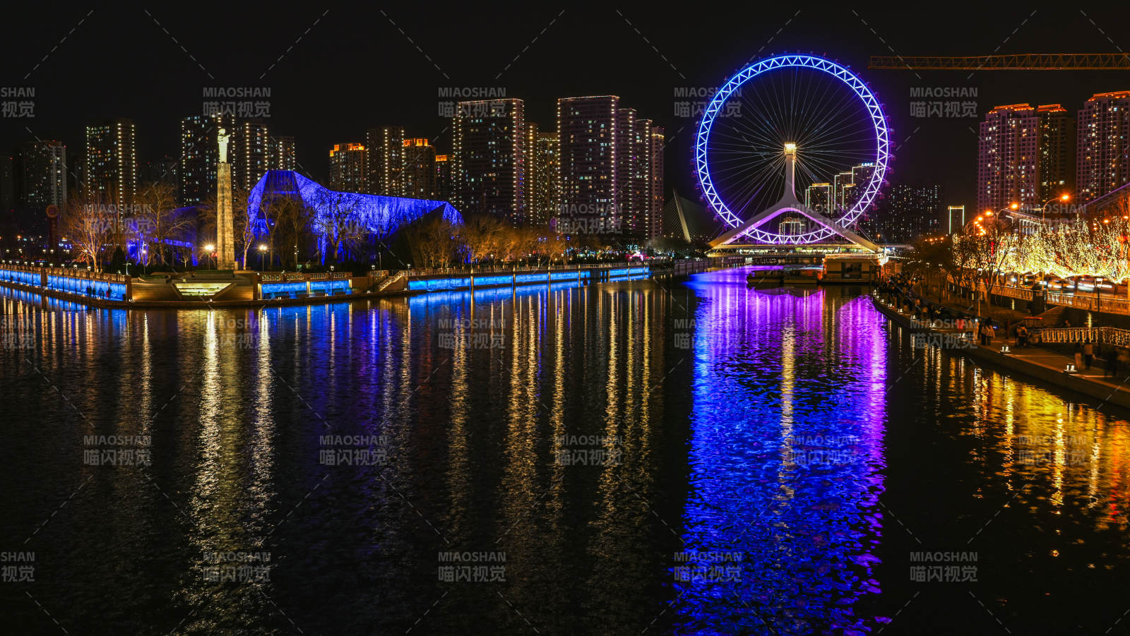 天津之眼夜景摩天轮倒影图片