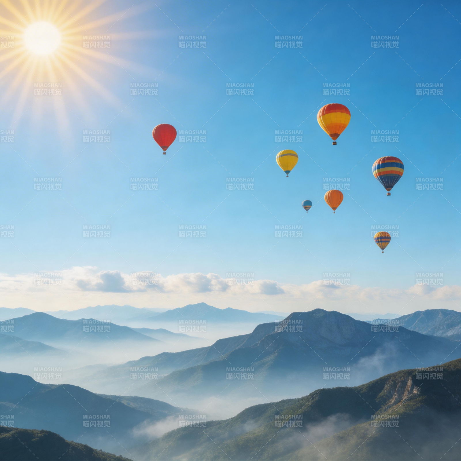 热气球翱翔山巅图片
