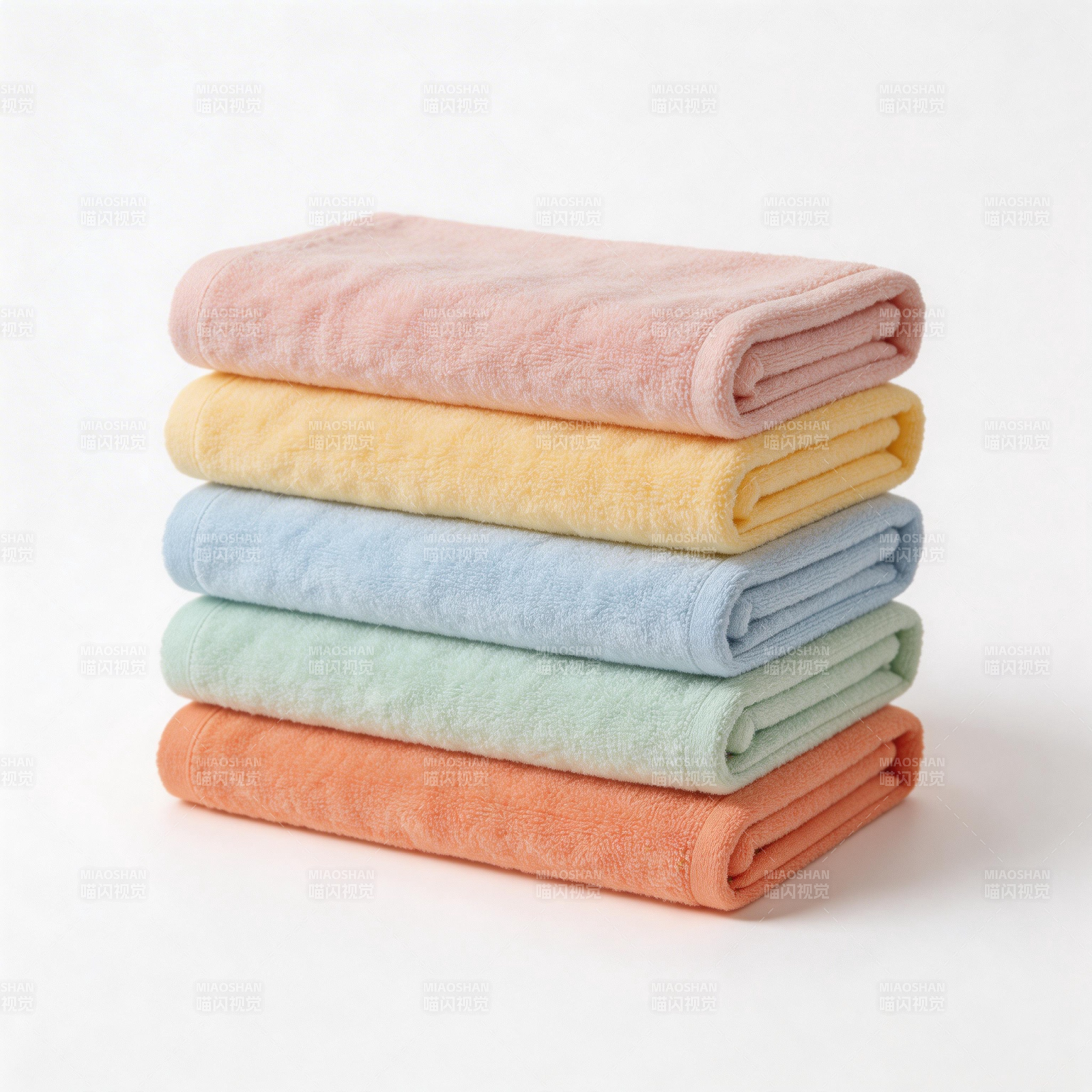 五色毛巾叠放图片